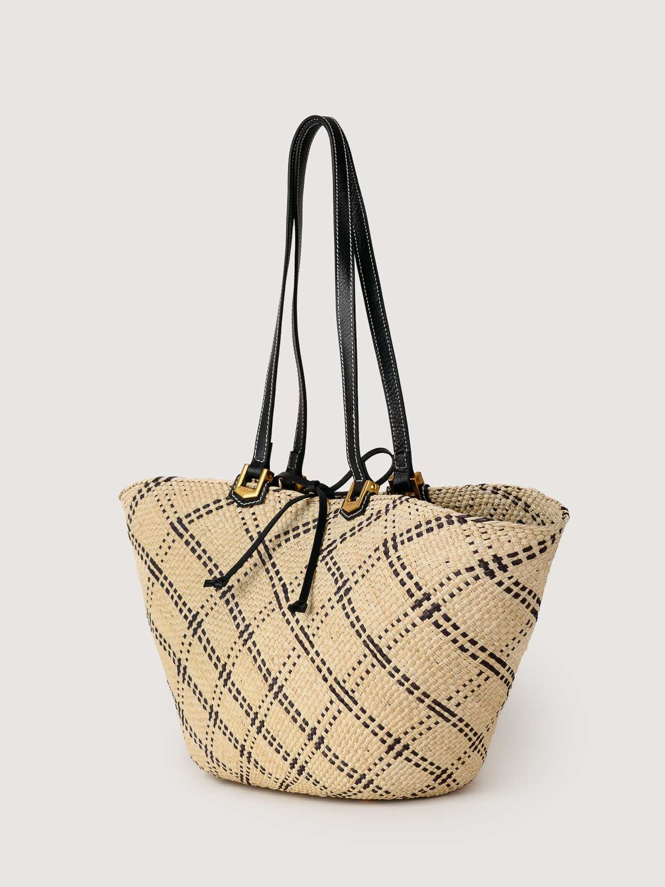 Side view highlighting the structured silhouette and contrasting panels.