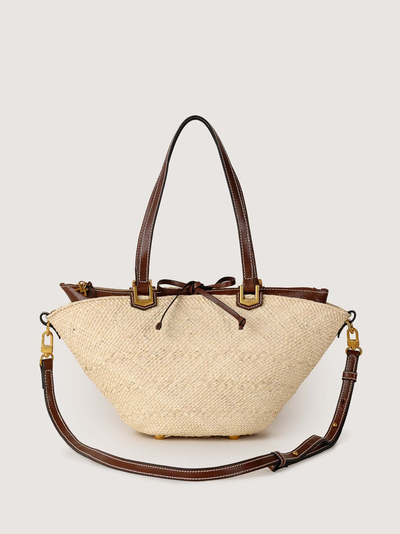 Front view of the Cartagena Mini in hazelnut, highlighting its sculpted shape and signature details.