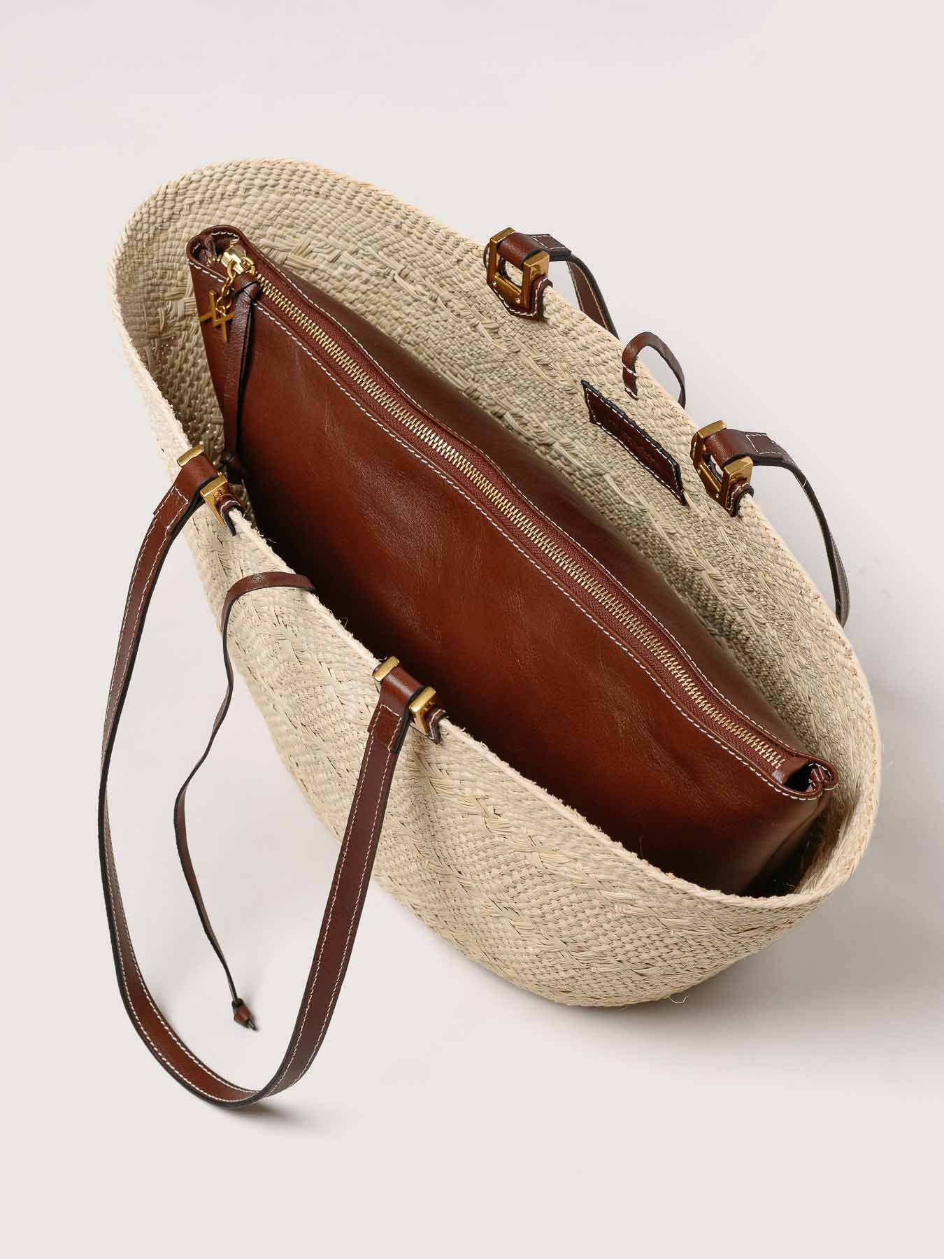 Cartagena iraca basket in hazelnut interior with matching leather pouch