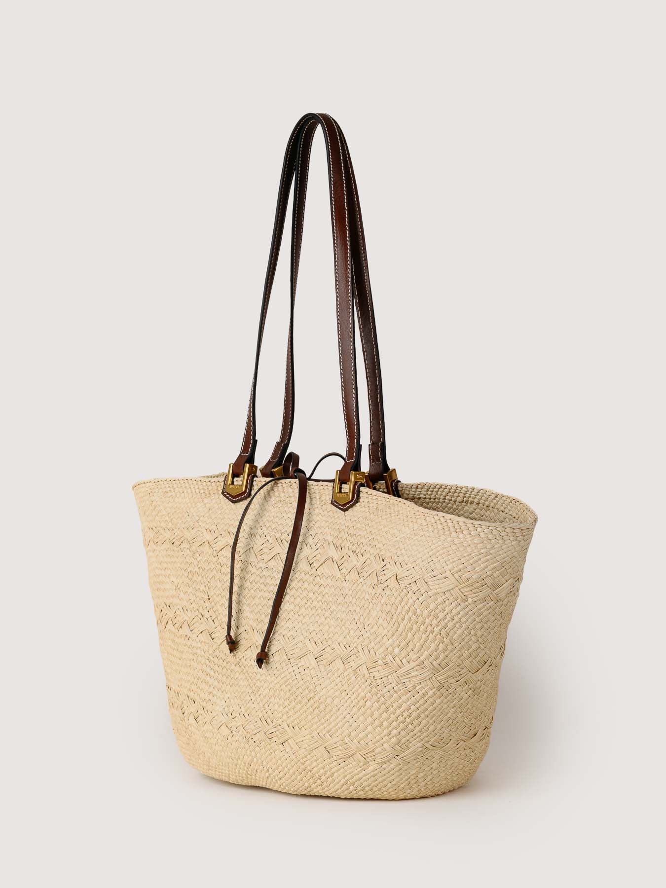 Cartagena iraca basket in hazelnut side view with leather details