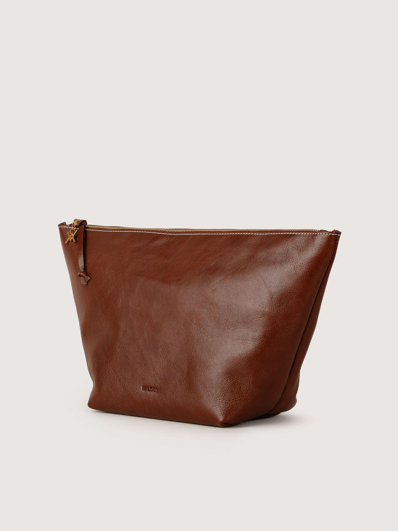Cartagena pouch in hazelnut vegetable-tanned leather side view