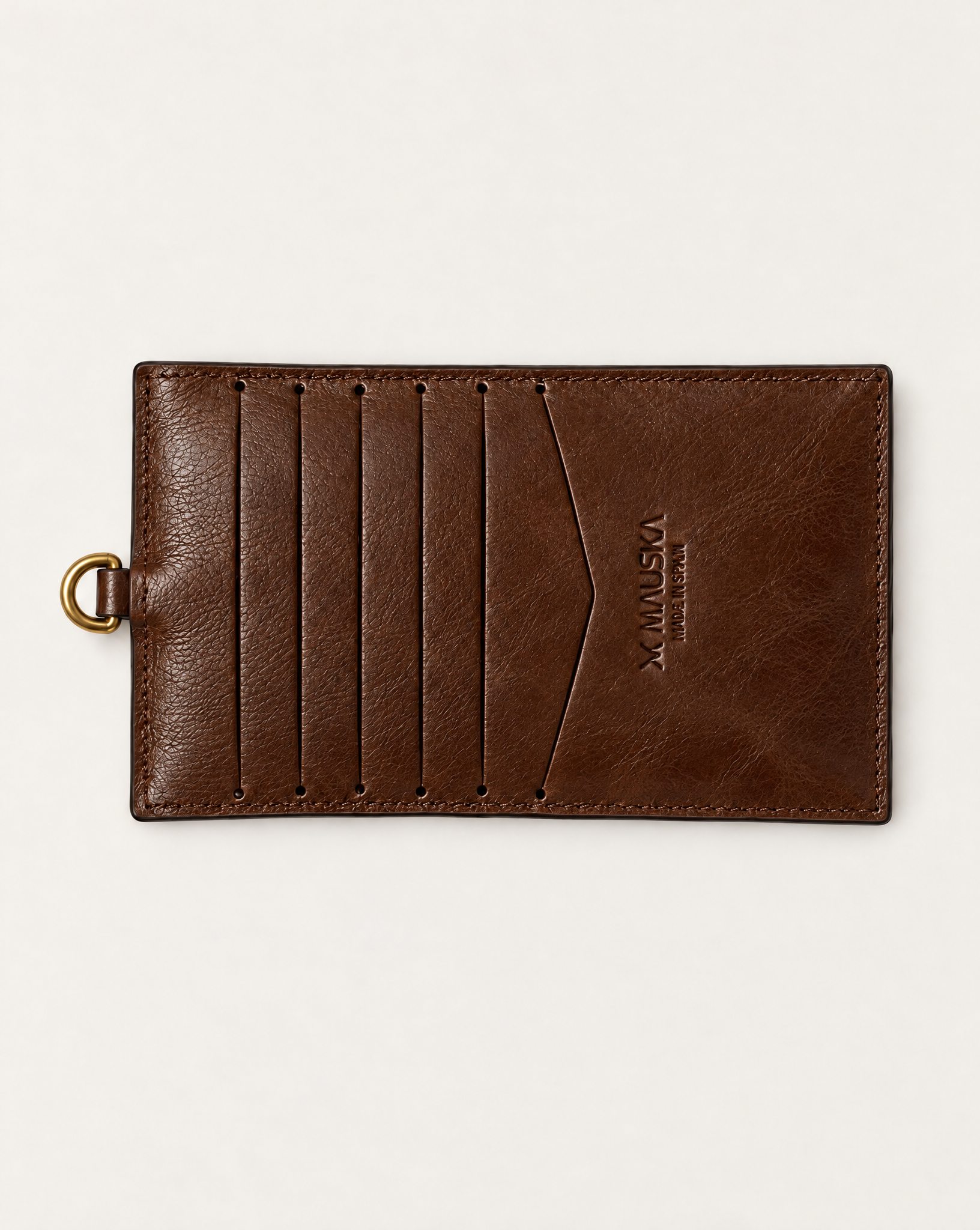 Back view of MAUSKA ARO tabaco vegetable-tanned leather wallet with multiple card slots and embossed MAUSKA logo.