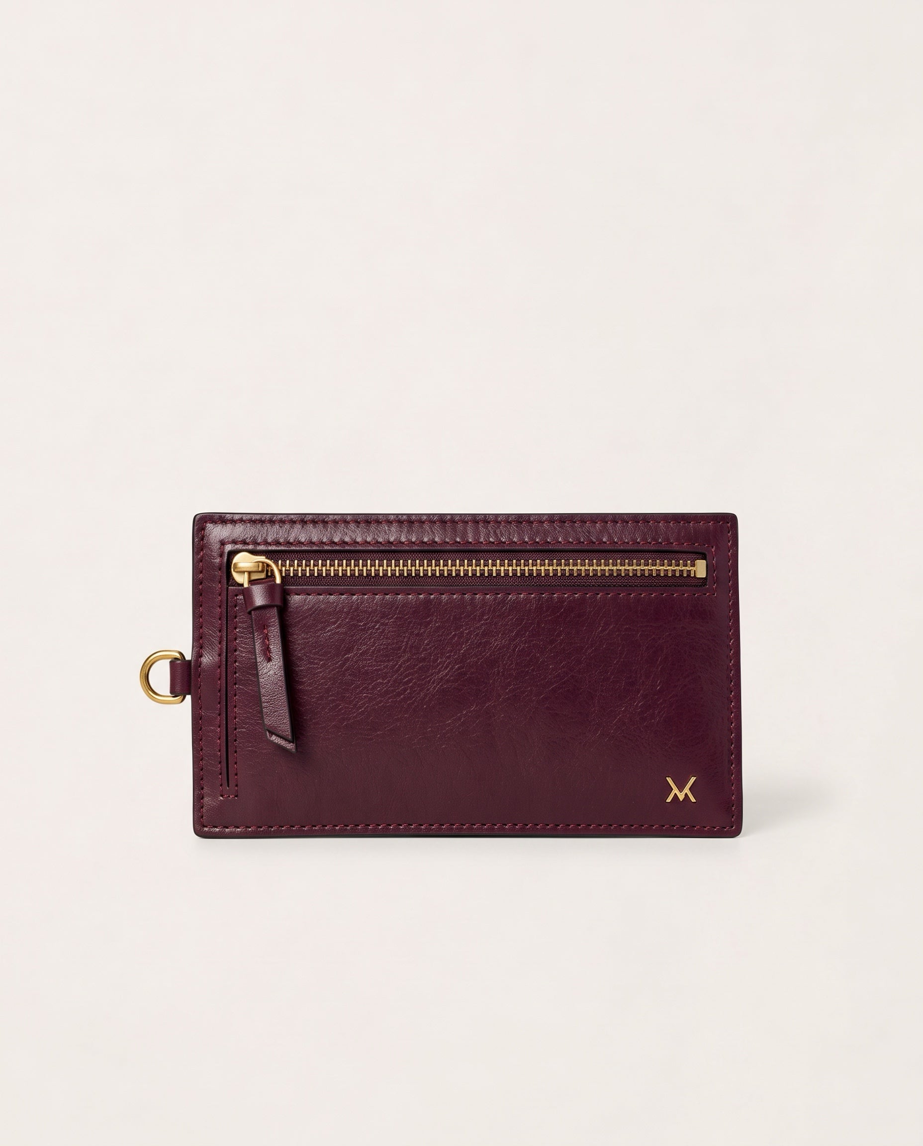 Front view of MAUSKA ARO burgundy leather wallet with gold-tone zipper and side attachment ring