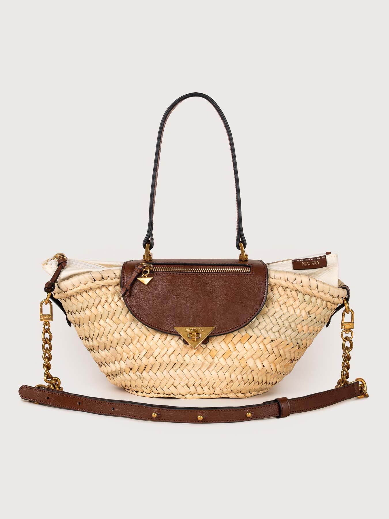 Front view of the Majorelle basket bag in hazelnut leather with handle by Mauska. Designed in San Sebastián and handcrafted in Ubrique, Spain. Defined by texture and contemporary design.