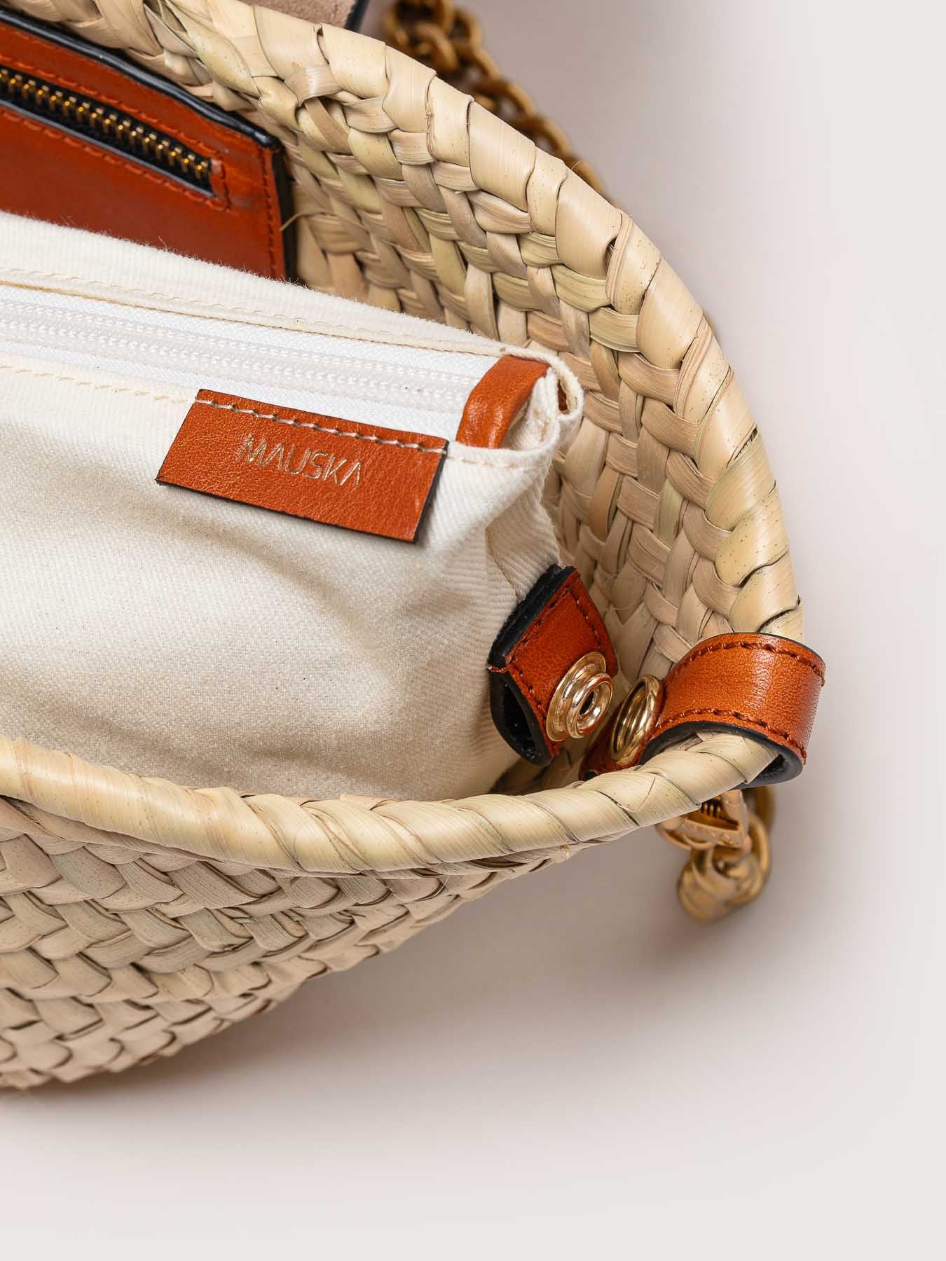 Interior of the Majorelle studded basket bag in honey leather by Mauska. Designed in San Sebastián and handcrafted in Ubrique, Spain. Emphasizing texture and contemporary design.
