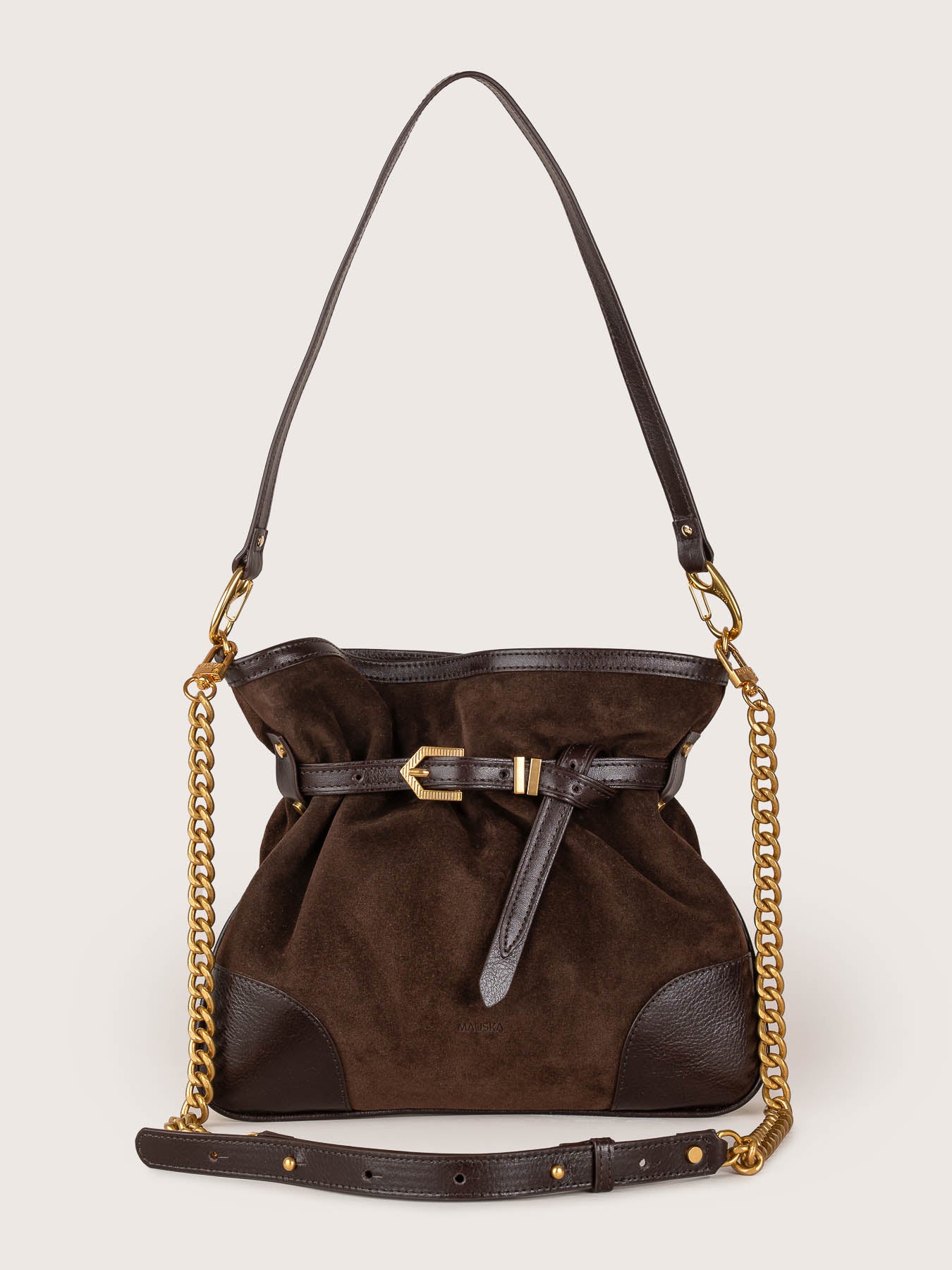 Front view of the Pereira Mini bag in ebony suede leather by Mauska. Designed in San Sebastián and handcrafted in Ubrique, Spain. Defined by texture and contemporary design.