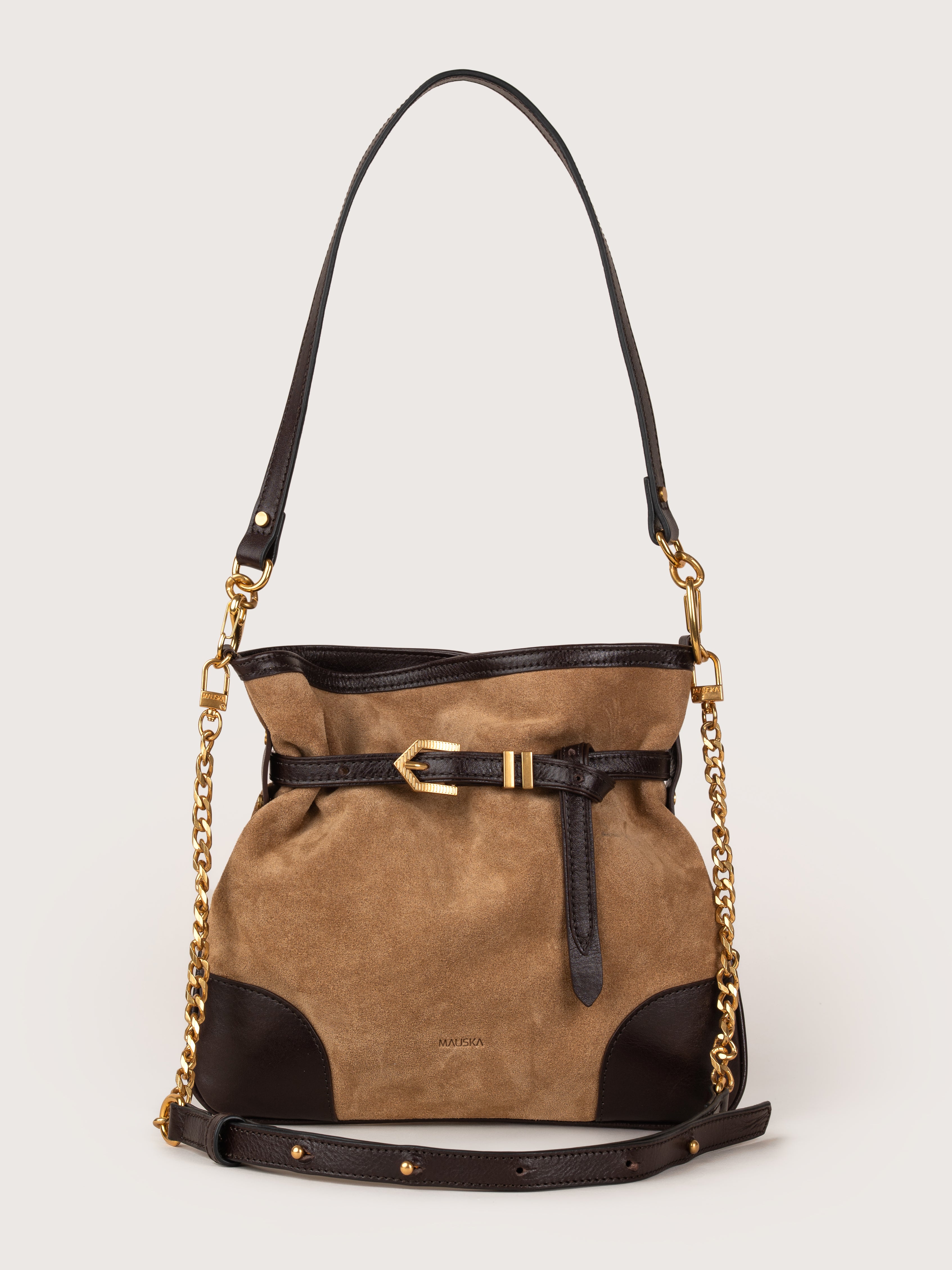 Front view of the Pereira Mini bag in sand suede leather by Mauska. Designed in San Sebastián and handcrafted in Ubrique, Spain. Defined by texture and contemporary design.