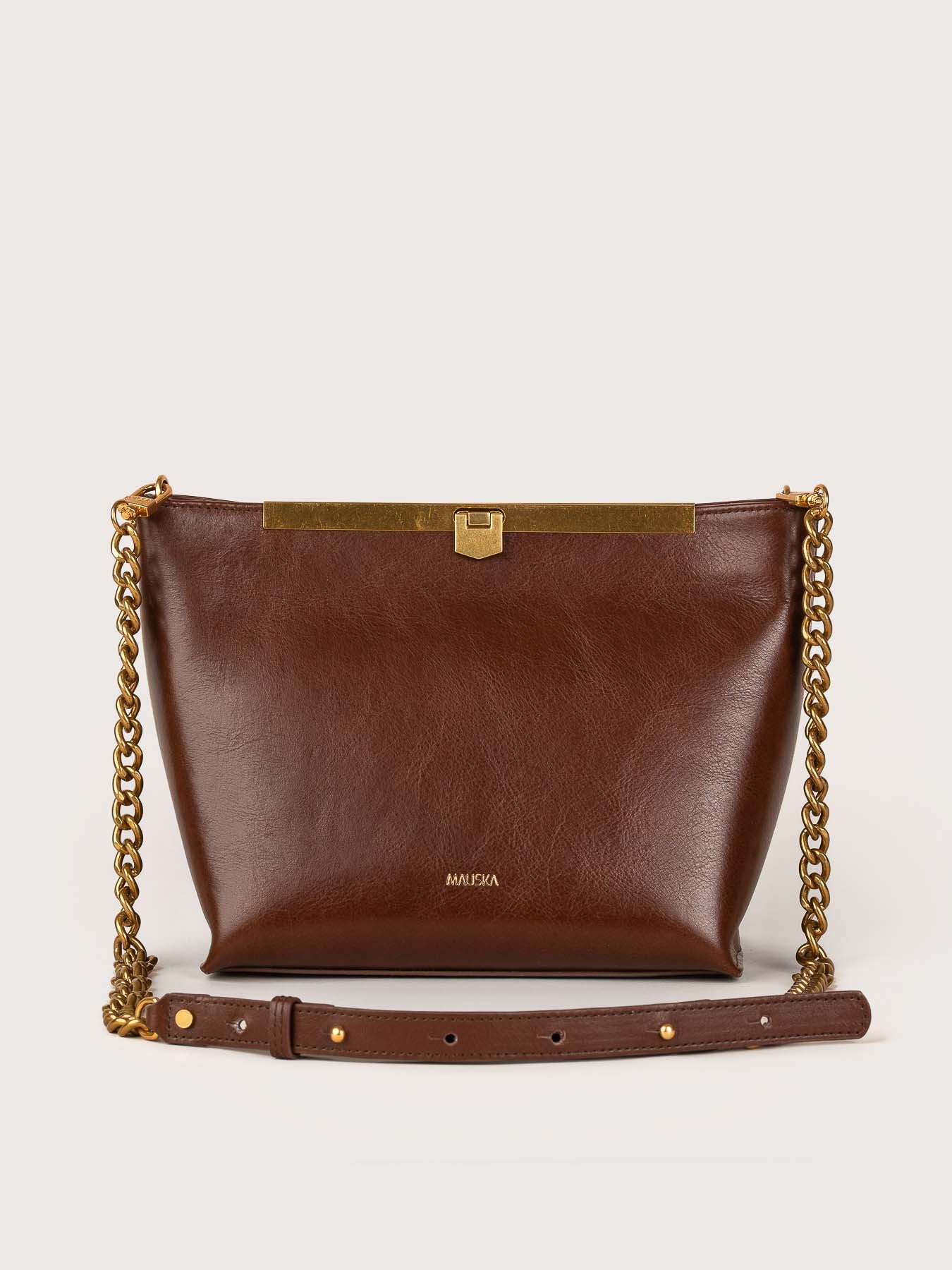 Front view of the Petra suede bag in hazelnut color by Mauska. Designed in San Sebastián and handcrafted in Ubrique, Spain. Defined by texture and contemporary design.