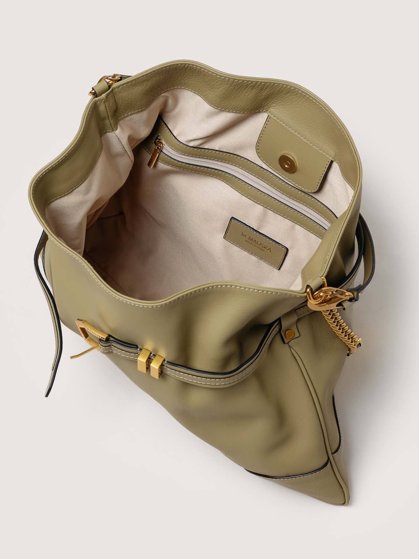 Interior of Pereira Maxi light olive leather bag with functional compartments.