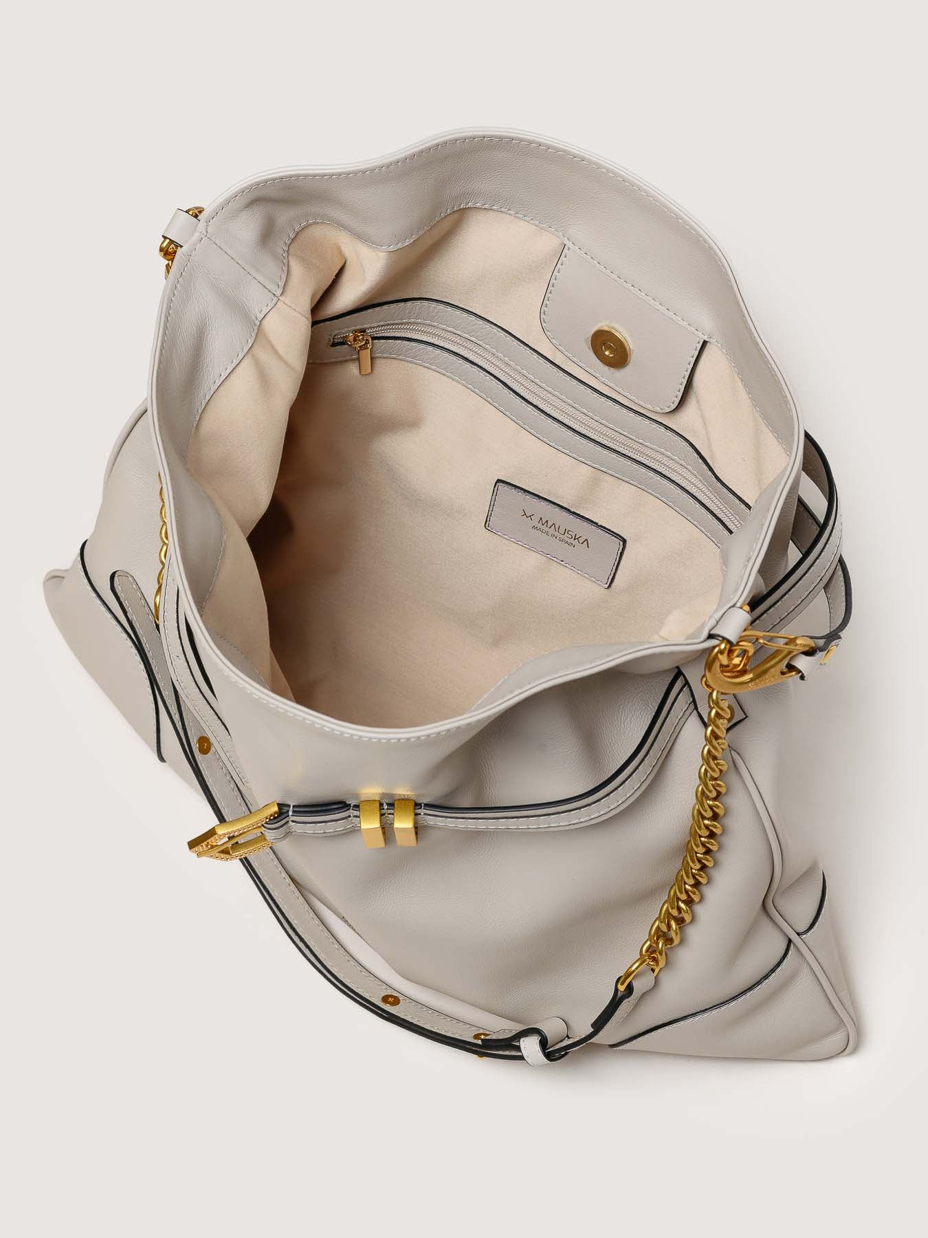 Interior of Pereira Maxi pearl grey leather bag with functional compartments.