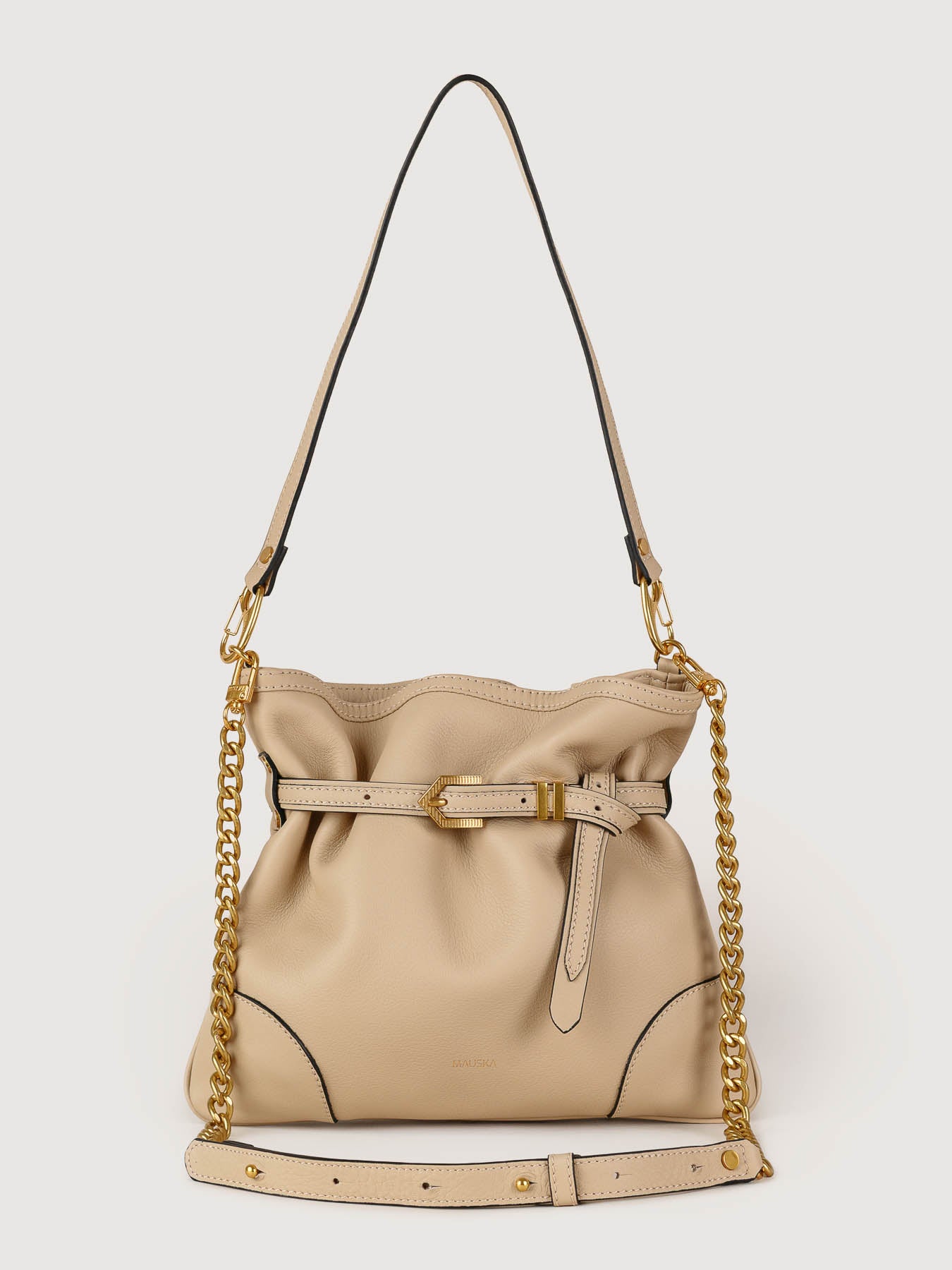 Front view of Pereira Mini beige leather bag handcrafted in Spain.