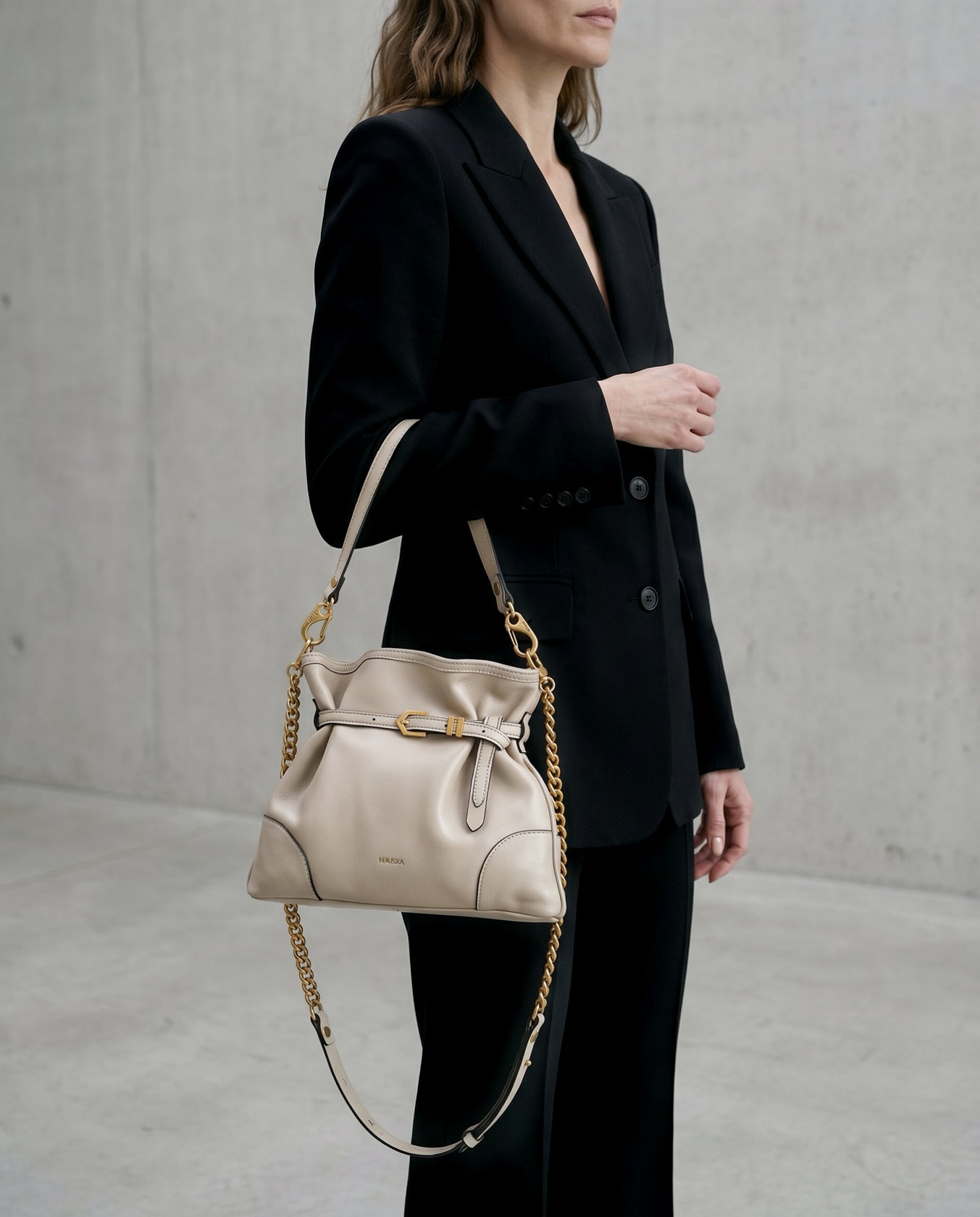 Pereira Mini bag in pearl grey leather worn on the shoulder