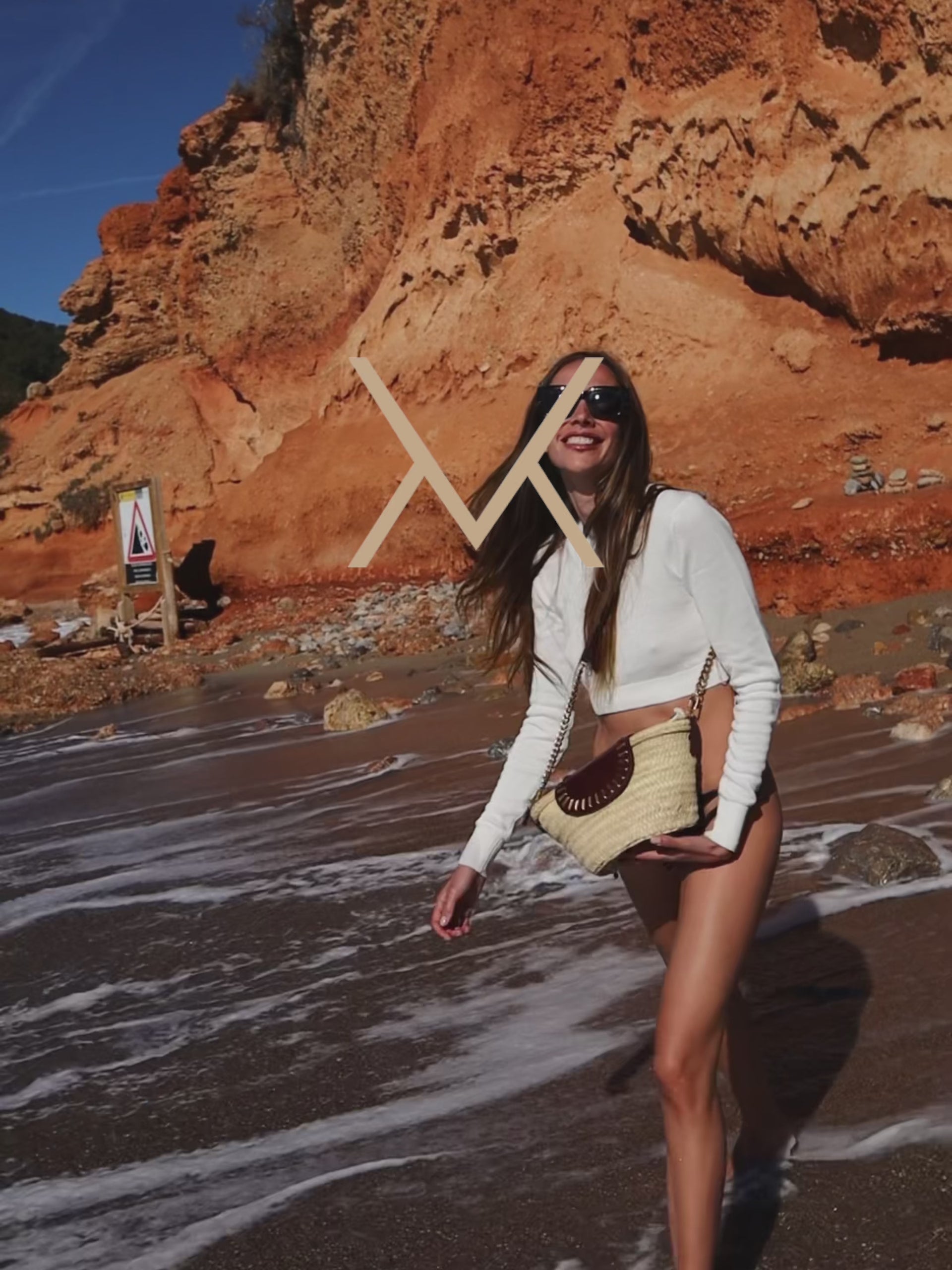 Detail video of the handwoven Majorelle studded basket bag in cognac by Mauska. Crafted in Ubrique, Spain.